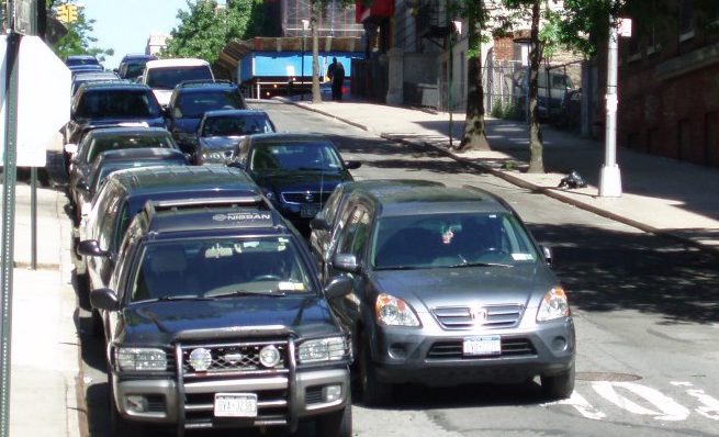 Double Parking in US Cities: A Curb Intelligence Problem, Not Just an Enforcement One